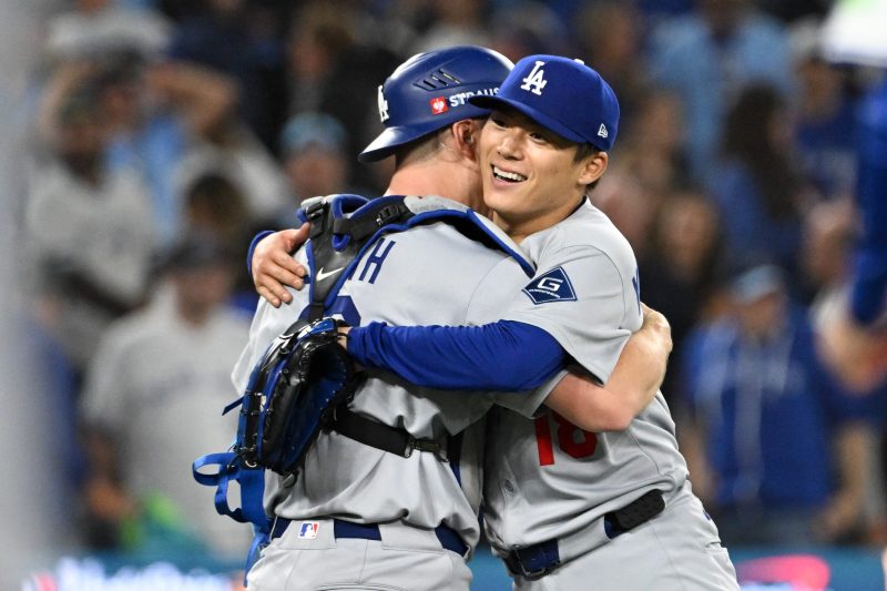 TORONTO — Blue Jays fans, it turns out, have been wasting all of their time booing and mocking the wrong Japanese star who spurned them in free agency.
It’s Los Angeles Dodgers ace Yoshinobu Yamamoto who is ruining the Blue Jays’ dreams of their first World Series title in 32 years.
Yamamoto carved his way into postseason history Saturday night, and tore the heart out of the Blue Jays’ high-powered attack, pitching a four-hit complete game as the Dodgers took a 5-1 victory over the Blue Jays, tying the World Series at one game apiece with the Series returning Monday night to Dodger Stadium in Los Angeles.
Yamamoto, who retired the final 20 batters he faced, became the first pitcher since Curt Schilling for the 2001 World Series champion Arizona Diamondbacks to throw back-to-back complete games in the playoffs. The last pitcher to throw consecutive complete games that included at least one World Series contest was Hall of Famer Tom Glavine with Atlanta in 1992.
And no Dodger has accomplished the feat since Orel Hershiser, who won the 1988 World Series MVP award.
It was a magnificent sequel to Yamamoto’s complete game performance in Game 2 of the NLCS against the Milwaukee Brewers, when he gave up just one run and three hits, striking out seven batters.
Yet, as good as that outing was in Milwaukee, this one was even better.
The Blue Jays’ best chance to get to Yamamoto was in the first inning when George Springer led off with a double and Nathan Lukes followed with a single, putting runners on the corners.
Yamamoto shrugged his shoulders, struck out Vladimir Guerrero, induced a soft lineout by Alejandro Kirk, and then struck out Daulton Varsho, ending the inning.
Yamamoto gave up just two hits the rest of the way, including one that was simply a blunder with a 100% catch probability when Ernie Clement’s second-inning infield popup landed harmlessly over charging first baseman Freddie Freeman’s head.
Yet, after Guerrero’s third-inning single and Alejandro Kirk’s sacrifice fly, Yamamoto was perfect.
Twenty up, 20 down.
Five strikeouts, zero walks.
Yamamoto was so dominant that the Blue Jays managed only two balls out of the infield during the 23-batter stretch.
“He’s been great all year,’ said Dodgers All-Star catcher Will Smith, who drove in three runs, including his first extra-base hit of the postseason with his seventh-inning homer that broke open a 1-1 tie. “He’s had the experience from last year. He is so focused right now.
“I have high expectations for him as always, but he’s just a competitor. He throws Strike 1. Gets ahead. He’s got nasty stuff. Just really makes it tough on hitters.’’
Make it virtually impossible.
It’s why the Dodgers shelled out $325 million two years ago to Yamamoto, who spurned the Blue Jays and their willingness to match the offer or go even higher.
“Whether it is a regular-season game, the playoffs or the World Series,’’ Yamamoto said, “I take every one as similarly as possible. Right now, I think I’m in a pretty good position mentally.”
So are the Dodgers.
The Series may be tied at 1-apiece but all of the momentum – and home-field advantage – are right back in the Dodgers’ court.
<em><strong>Follow Nightengale on X: @Bnightengale</strong></em>
This post appeared first on USA TODAY